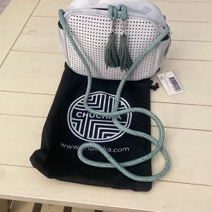 Chuchka Nepprene small shoulder bag. NWT. While with blue & black trim.